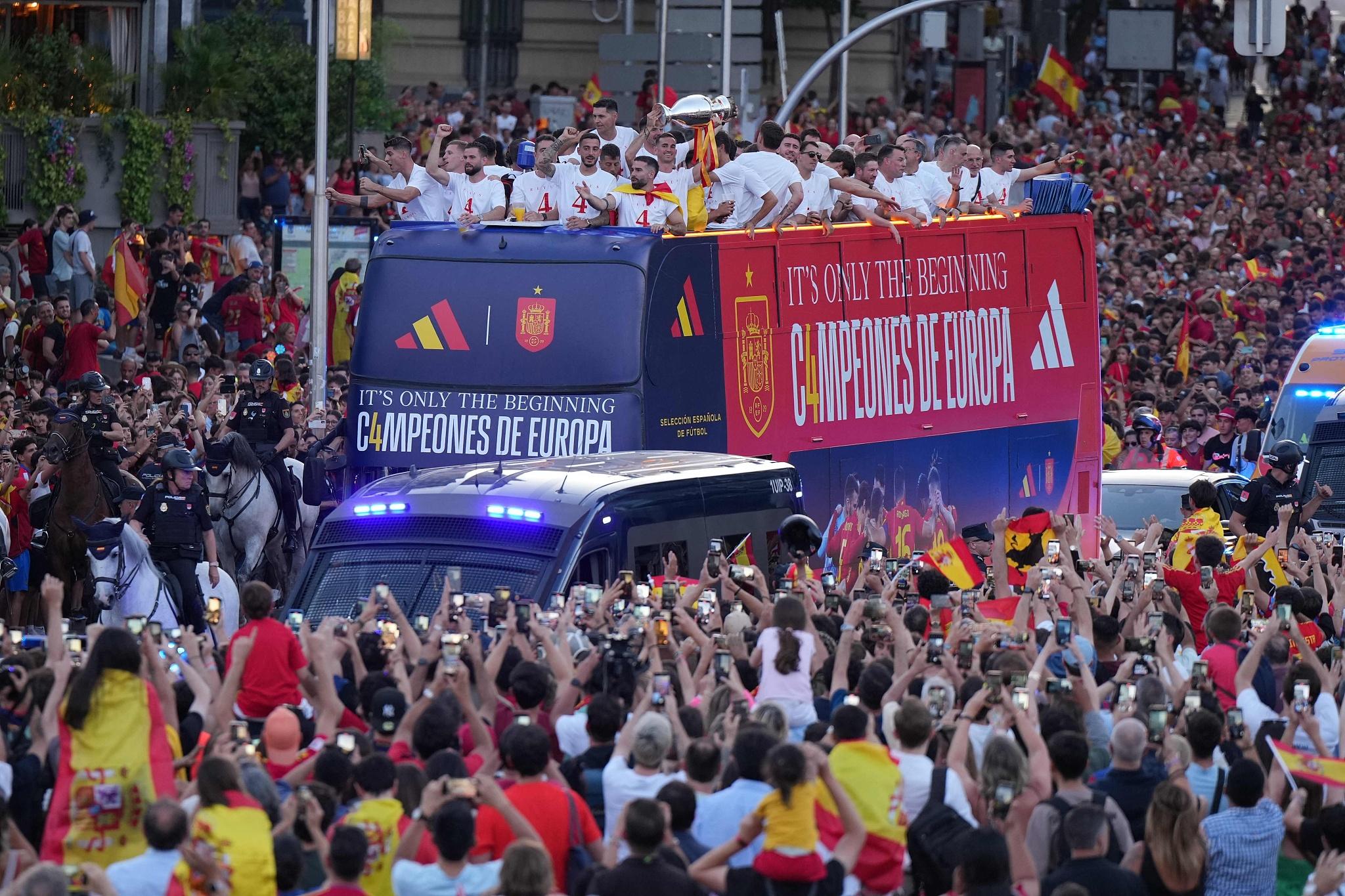 Spain's players celebrate winning the Euro Cup.